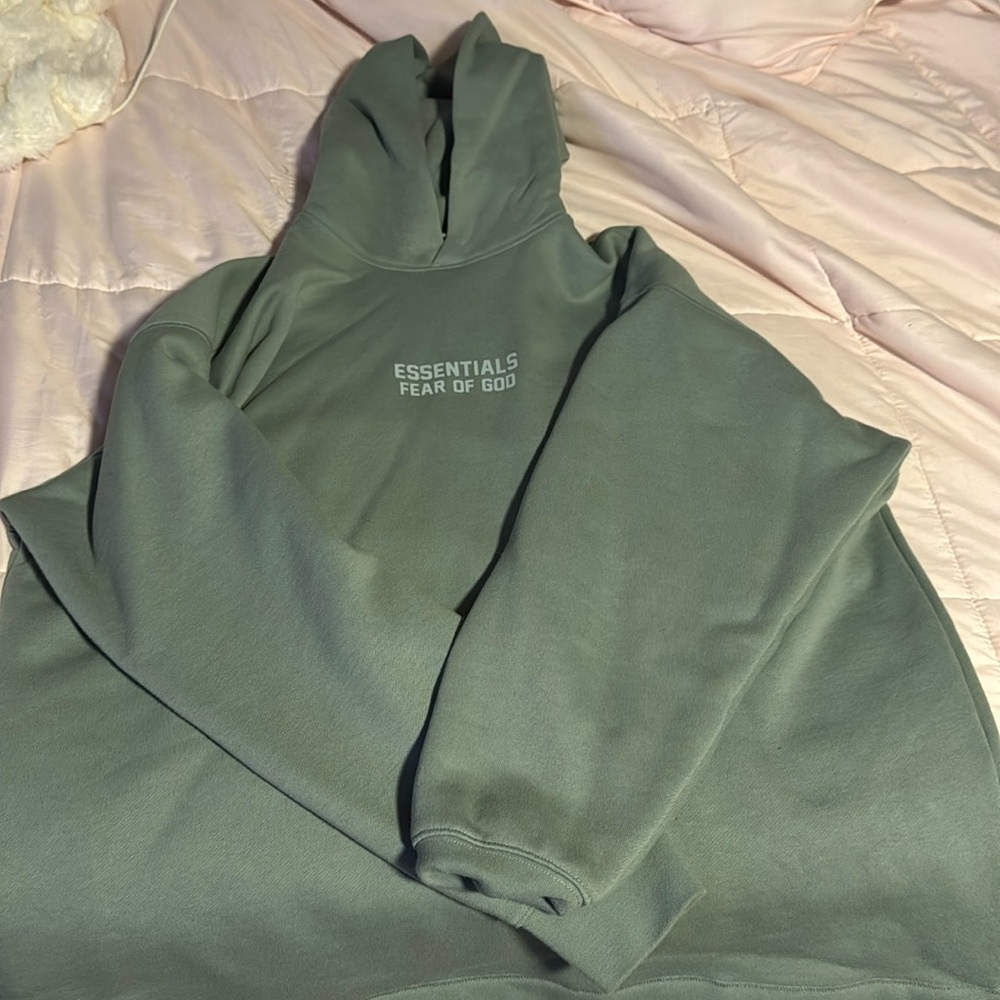 XS Mens Essential Fear of God hoodie.